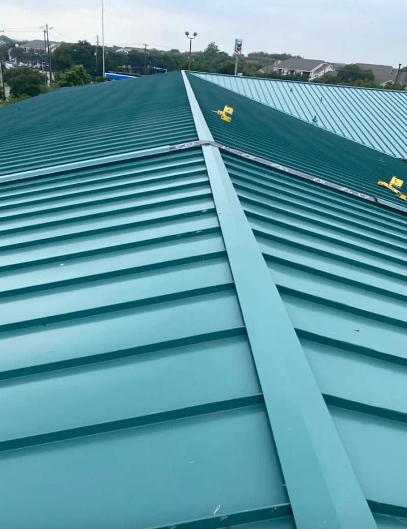 Green commercial metal roof ridge and valley for Metal Roof Repair in Lovejoy